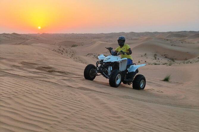 1 hour Quad Biking Experience with pick and drop - Riding into the Sweihan desert