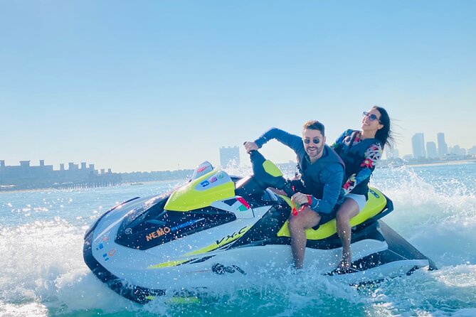 30-Min Jet Ski Tour: English Breakfast, Burj Al Arab View Bliss - Riding a jet ski with a guide