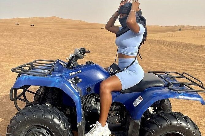 4 Hours Desert Tour with Quad Bike Camel Ride & Sandboard - A 15-minute camel ride for a slower view