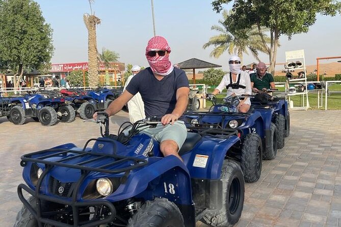 4 Hours Desert Tour with Quad Bike Camel Ride & Sandboard - Leaving Dubai for Lahbab