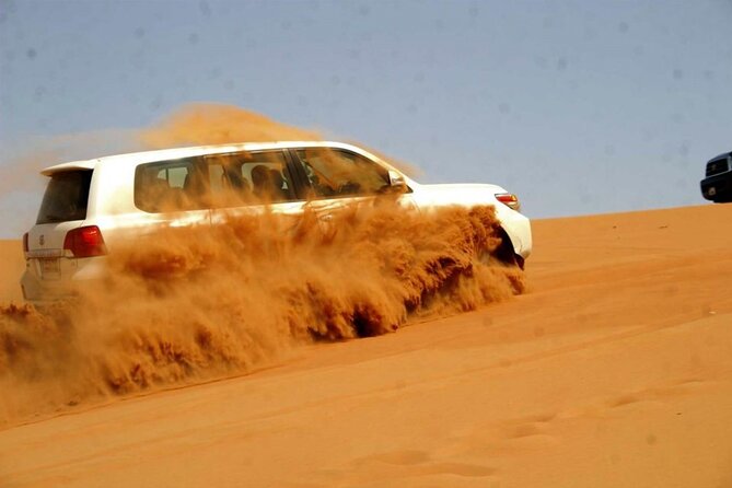6 Hour Thrilling Desert Safari in 4x4 with Entertainment Show - Camp time, henna, and Arabic costume photographs