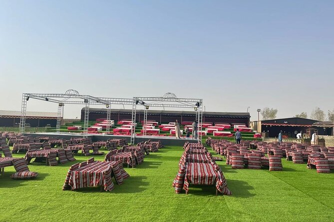 6 Hours Desert Safari Dubai Tour with BBQ Dinner & Live Shows - Sandboarding and the sunset photo point