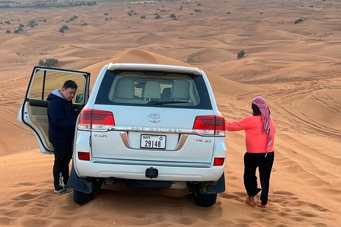 6 Hours Desert Safari Dubai Tour with BBQ Dinner & Live Shows - Camel riding and the limits of the experience