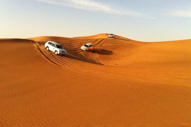 Abu Dhabi 4x4 Desert Safari BBQ Dinner , Camel Ride , Belly Dance - Leaving Abu Dhabi for Al Khatim Desert