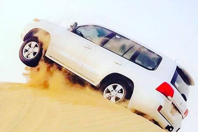 Abu Dhabi: 7-Hours Desert Safari with BBQ, Camel Ride & Sandboarding - A five-minute camel ride, not a camel trek