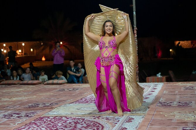 Abu Dhabi: 7-Hours Desert Safari with BBQ, Camel Ride & Sandboarding - Quad biking and other optional extras