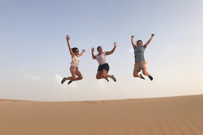 Abu Dhabi: 7-Hours Desert Safari with BBQ, Camel Ride & Sandboarding - Sunset, sandboarding, and the camel farm