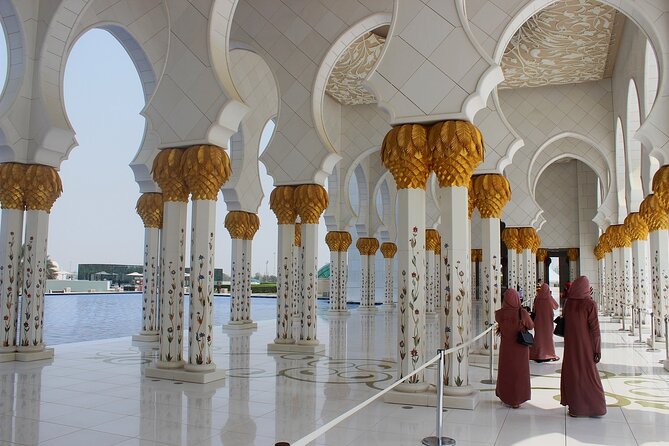 Abu Dhabi City Tour of Grand Mosque, Palace, Louvre, and Ferrari - Emirates Palace and Etihad Towers: grand sights, short stops