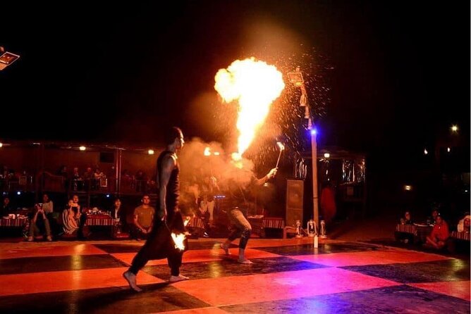 Abu Dhabi Desert Safari BBQ Dinner Live Shows Pick & Drop More - Camel riding and sandboarding