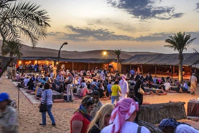 Abu Dhabi Desert Safari BBQ Dinner Live Shows Pick & Drop More - Belly dance, Tanura, and fire performances