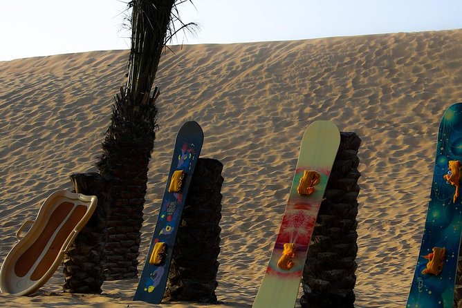 Abu Dhabi Desert Safari (Dune Bashing, BBQ Dinner, Camel Ride & Sand Skii) - Belly dance and Tanoura after dark
