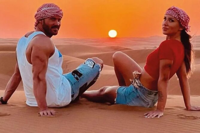 Abu Dhabi Desert Safari: Live Shows, Camel Rides & BBQ Buffet - Camel riding, henna, and Bedouin-style camp time