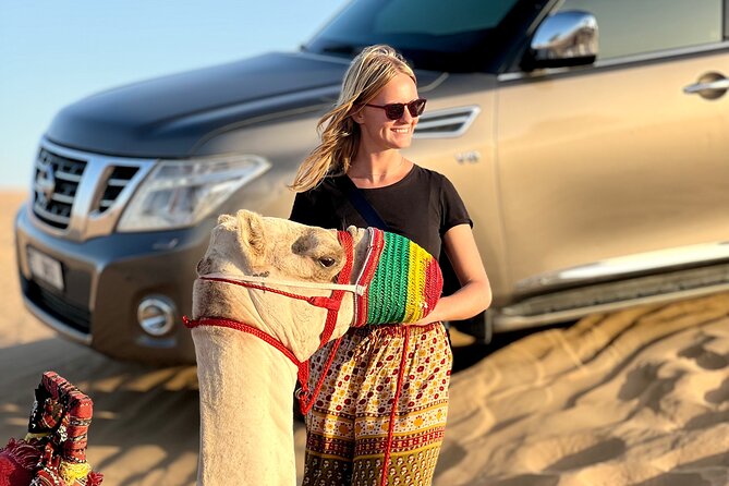Abu Dhabi Desert Safari Tour with Shows & Buffet Dinner - Sandboarding and the sunset photo stop
