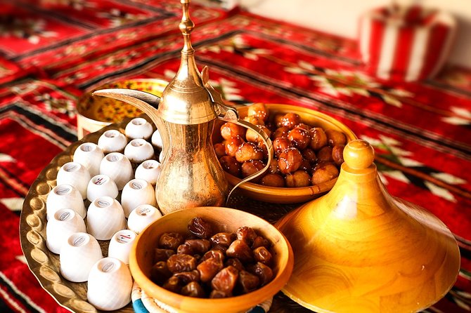 Abu Dhabi: Desert Safari with BBQ, Camel Ride & Sandboarding - From Abu Dhabi hotels to the open desert