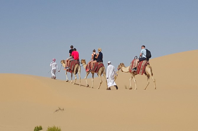 Abu Dhabi Desert safari with BBQ Dinner,Sandboarding & Camel ride - Crossing Abu Dhabi’s dunes in a six-person Land Cruiser