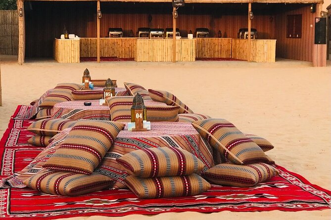 Abu Dhabi Desert safari with BBQ Dinner,Sandboarding & Camel ride - Reaching the Bedouin-inspired camp after sunset