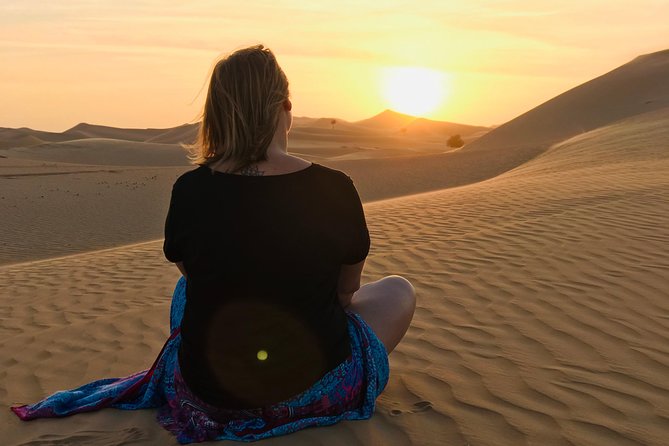 Abu Dhabi Desert safari with BBQ Dinner,Sandboarding & Camel ride - A camel farm visit with useful limits