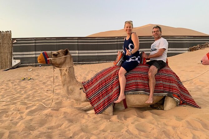 Abu Dhabi Desert Safari with BBQ Dinner & Shows - Camel riding, henna, coffee, and desert culture