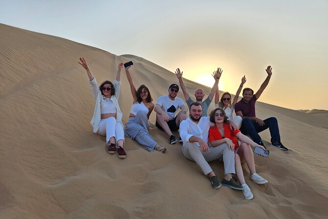 Abu Dhabi Desert Safari With Live Shows And BBQ Buffet Dinner - Sand boarding, henna, and optional motor activities