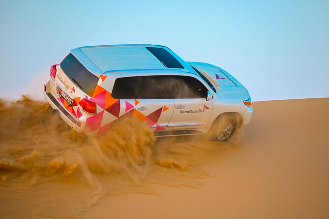 Abu Dhabi Evening Desert Safari - Dune bashing Camel ride and BBQ - From Abu Dhabi city to the soft desert sand