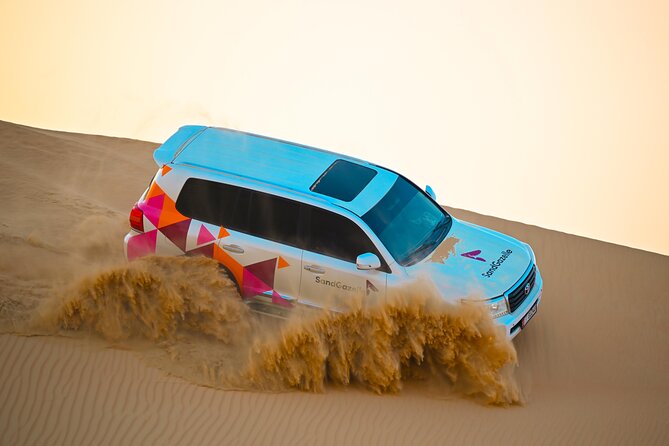 Abu Dhabi Evening Desert Safari - Dune bashing Camel ride and BBQ - BBQ dinner and live shows under the stars