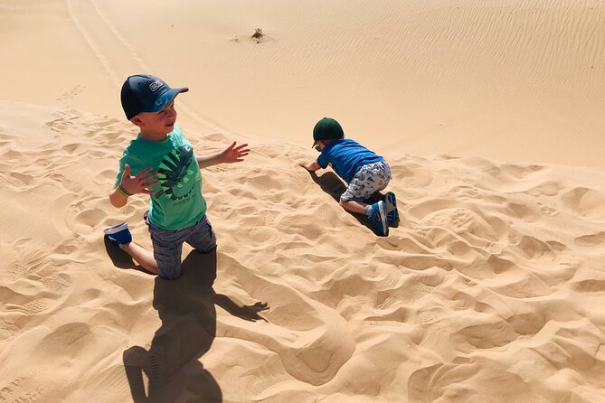 Abu Dhabi Morning Desert Safari,Dune Bashing,Sandboarding,Camel Riding&Quad Bike - Camel riding and a closer look at camp life