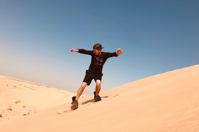 Abu Dhabi Morning Desert Safari,Dune Bashing,Sandboarding,Camel Riding&Quad Bike - Leaving the city for the open dunes
