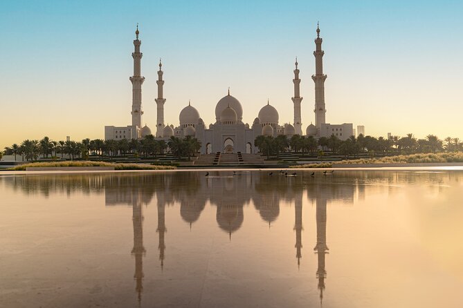 Abu Dhabi Sightseeing Tour: Sheikh Zayed Mosque, Heritage Village & Dates Market - Palace views from the coach