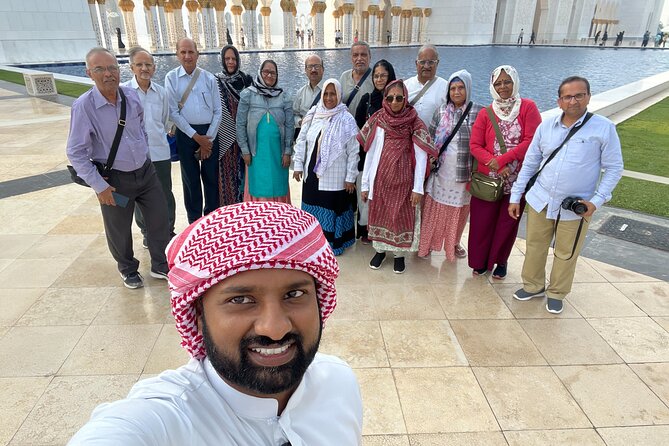 Abu Dhabi Tour Grand Mosque Heritage Village Emirates Palace - Yas Island and the Ferrari World photo stop