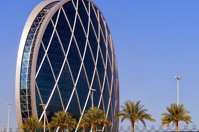 Abu Dhabi Tour in Private 4x4 with Grand Mosque, Louvre & Ferrari - Ferrari World or Warner Bros. World on Yas Island