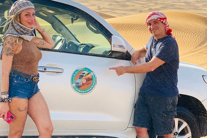 Abudhabi Desert Safari - Sandboarding on the dunes