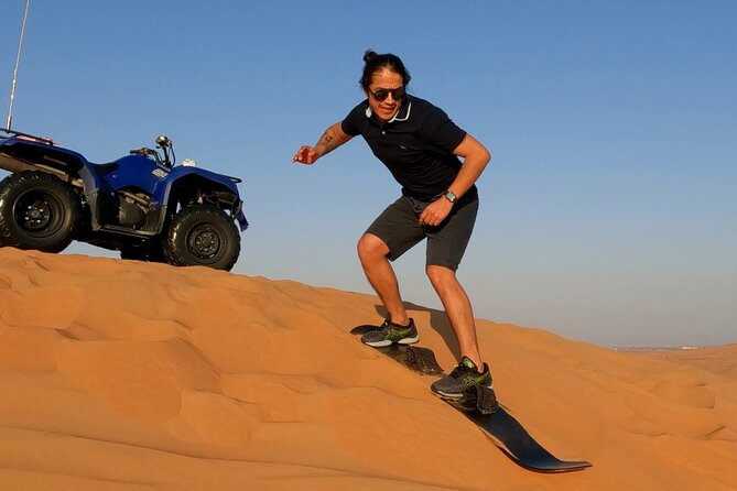Adventure Quad Bike Safari, Camel Ride & Sandboarding - Sandboarding for a simple burst of fun