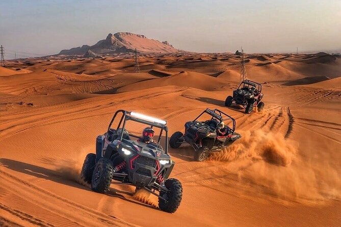 Adventurous Red Dune Desert Safari Deal with Quad Bike,Shows &BBQ - Dune bashing across the red sand