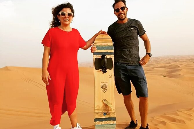 Afternoon Desert Safari with Quad Bike, Camel Ride and Sandboarding - Sandboarding on the Dunes