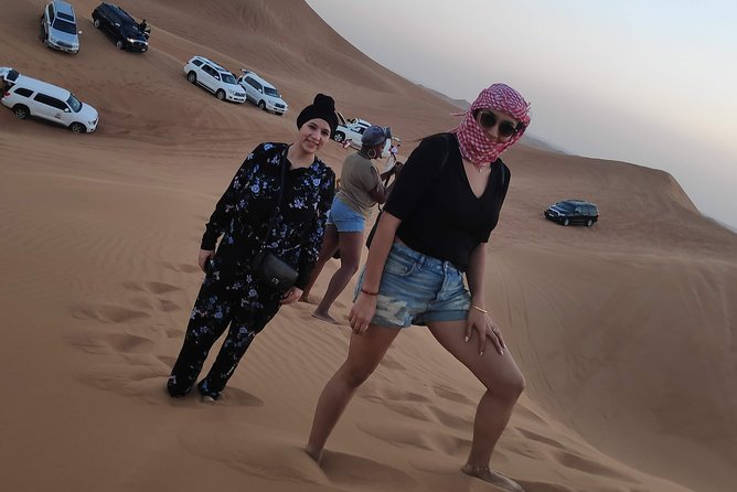 Afternoon Dune Drive Safari with SunSet Photo & Sand Boarding - Sandboarding on the red dunes