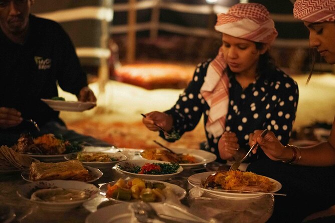 Al Marmoom Oasis Experience with Bedouin Dinner - Bedouin navigation and stargazing after dark