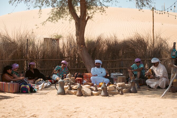 Al Marmoom Oasis Luxury Tent with Bedouin Dinner - Dinner, local desserts, and a night of performances