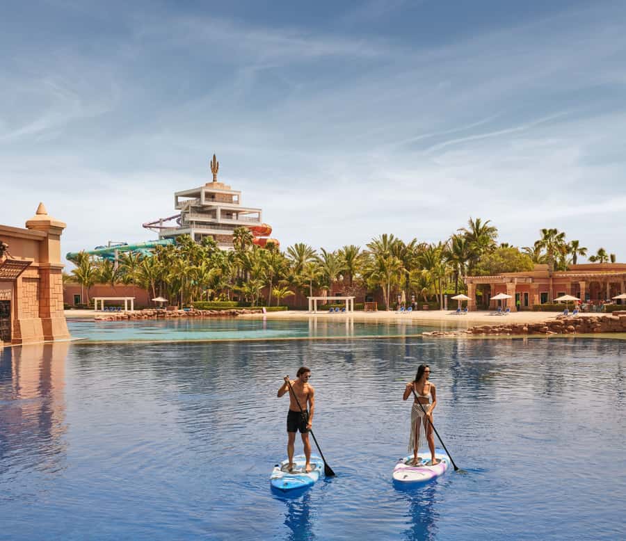 Aquaventure World: Dolphin Paddle and Waterpark Day Pass - Paddling around Dolphin Bay in a group of six