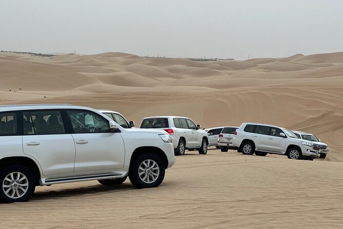Arabian Desert Safari Abu Dhabi: 6Hour Tour with BBQ & Live Shows - The long ride out to Al Khatim