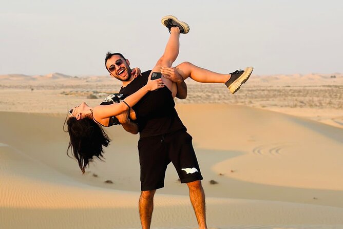 Arabian Desert Safari Abu Dhabi: 6Hour Tour with BBQ & Live Shows - Dune bashing in a Land Cruiser