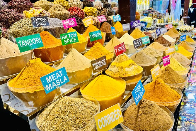 Authentic Old Dubai, Souks, Tastings & local boat Guided Tour - Old Souk and Deira’s Spice Market