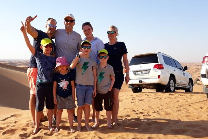 Best Dubai Desert Safari with Buffet Dinner,Sand Boarding & Shows - The big picture: one busy evening in the Dubai desert