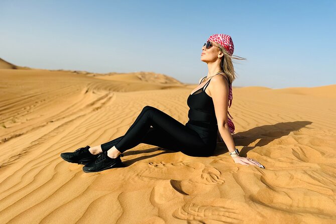 Best Dubai Desert Safari with Buffet Dinner,Sand Boarding & Shows - Sandboarding and sunset photographs