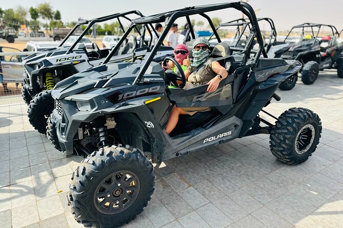 Best Dubai Desert Safari with Buffet Dinner,Sand Boarding & Shows - The Bedouin-style camp after dark