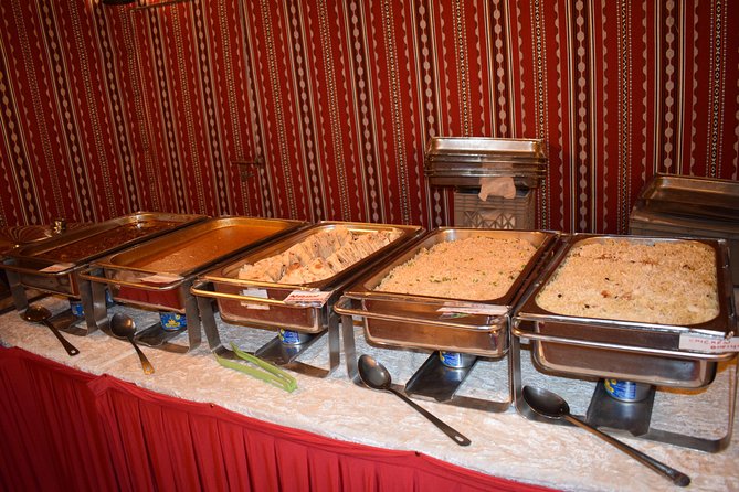 Classic Dubai Desert Safari with BBQ Dinner and Camp activities - BBQ dinner and traditional entertainment