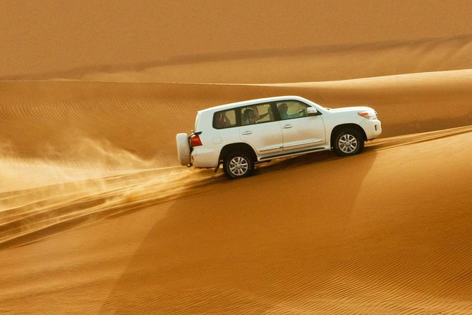 Combo Dubai City Tour and 4X4 Desert Safari with Dinner - Palm Jumeirah and the tower-lined drive downtown