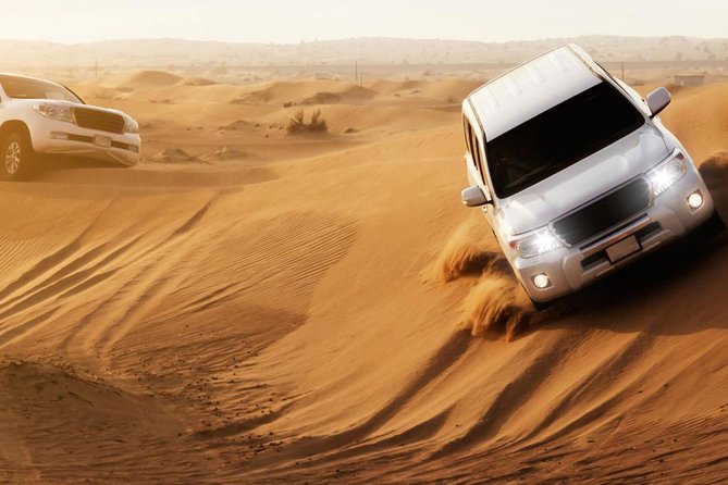 Combo Dubai Frame and Desert Safari with Dinner - Sand boarding, photo stops, and sunset