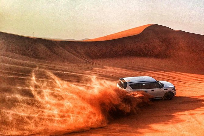 Desert 4x4 Safari, Complimentary ATV ride, Camel Ride, BBQ Dinner & Live Shows - From city pickup to the open dunes