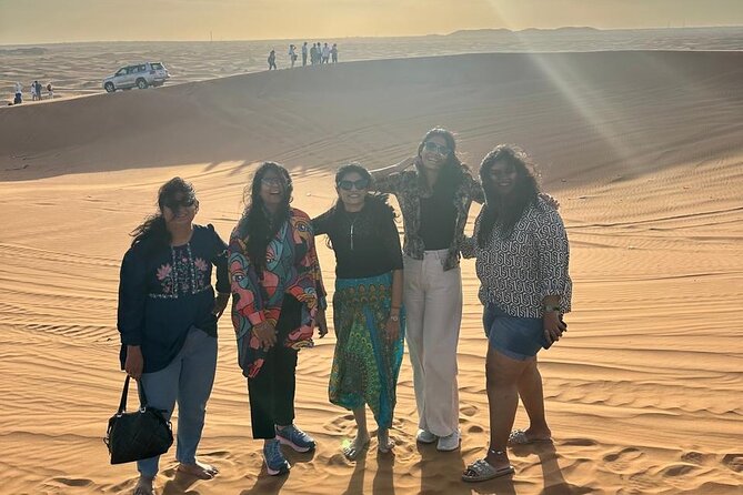 Desert Adventure Safari - Sandboarding and the sunset photo stop