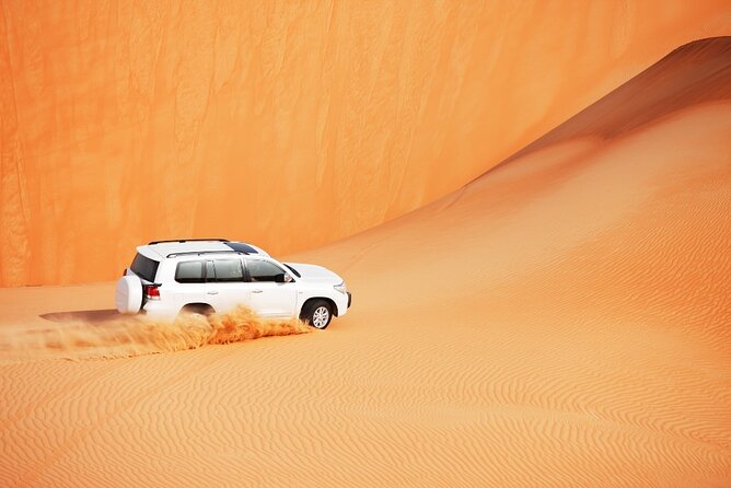 Desert Safari Abu Dhabi w/ Sand Boarding, Camel Ride & BBQ Dinner - A traditional welcome at the Bedouin camp